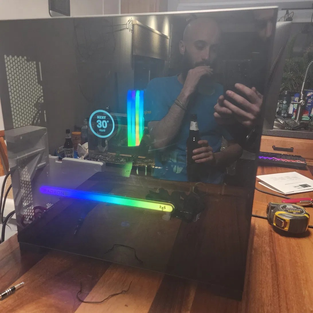 Finished PC build with RGB memory and NZXT cooler display
