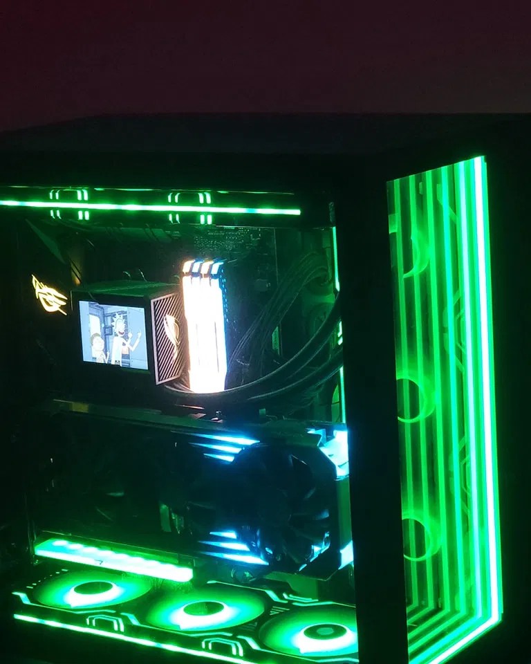 Green-lit custom PC built by the owner
